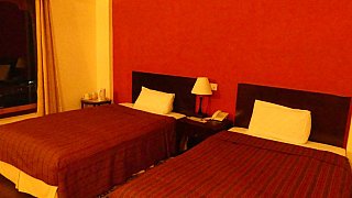Zimmer im Druk Zhongar Hotel in Mongar - Ost-Bhutan: Essen & Schlafen